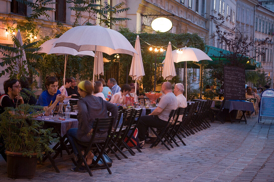 People sitting in a typical Beisl, Spittelberg, Vienna, Austria