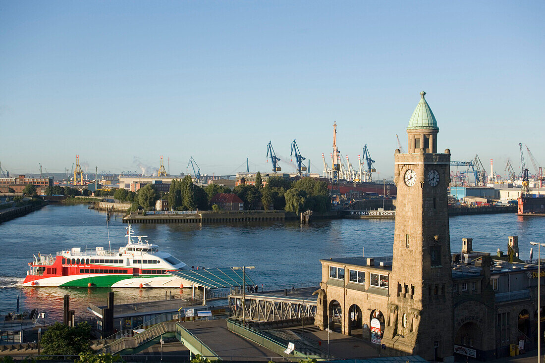 Tower and harbour with cranes in background, View over tower at Landungsbrücken to dockyardwith cranes, Sankt Pauli, Hamburg, Germany