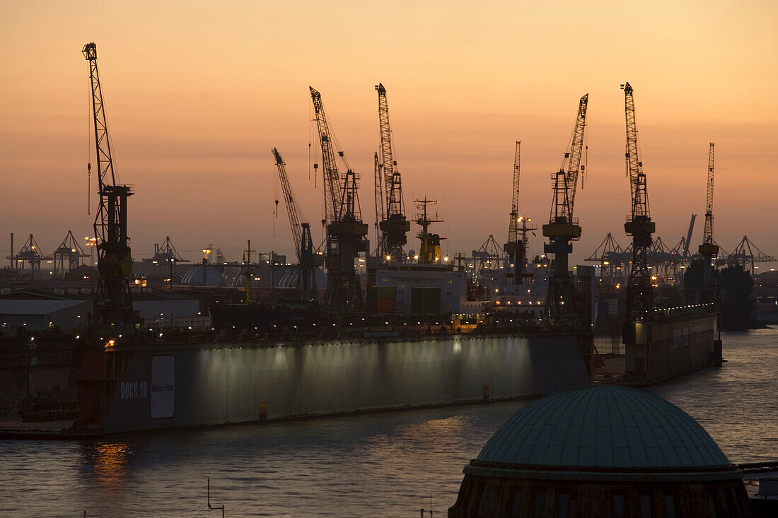 Dockyard with cranes in the dusk, Landungsbruecken, St. Pauli, Hamburg, Germany