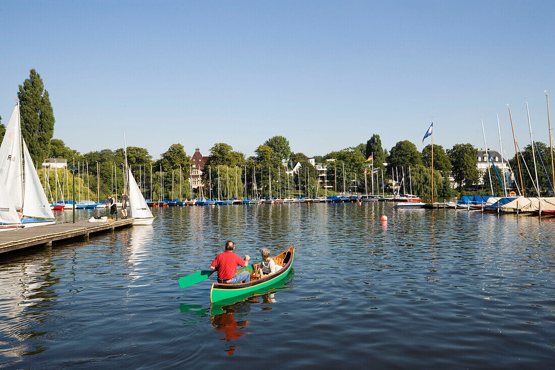 People in a canoe, People in a canoe near boat rental Bobby Reich at lake Alster, Hamburg, Germany