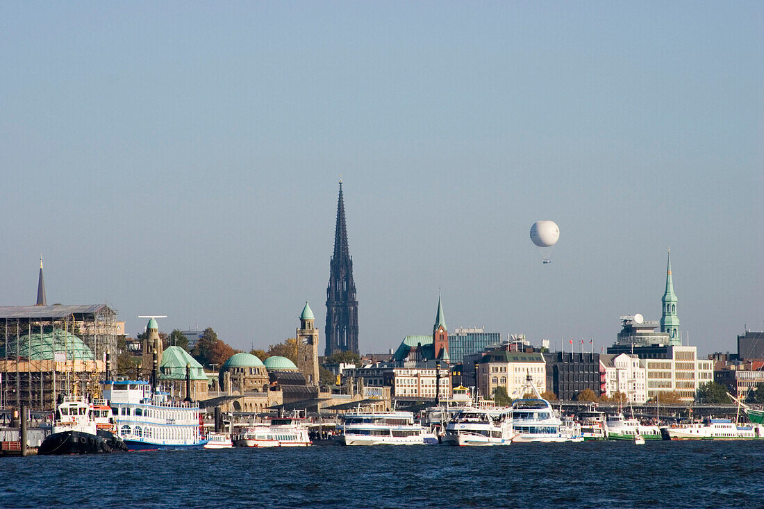 Harbor and St. Michaelis Church, viewing balloon in background, Hamburg, Germany
