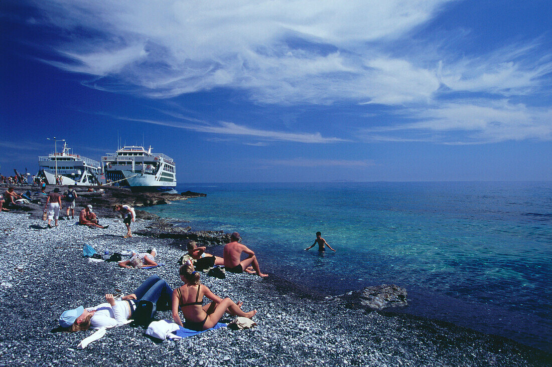 People on a beach, ferries in the background, Agia Roumeli, Samaria Gorge, Crete, Greece