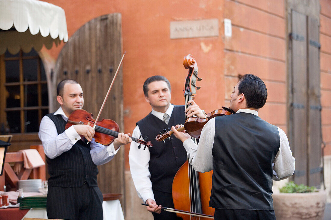 Musicians in front of a restaurant, Musicians in front of a restaurant on Castle Hill, Buda, Budapest, Hungary