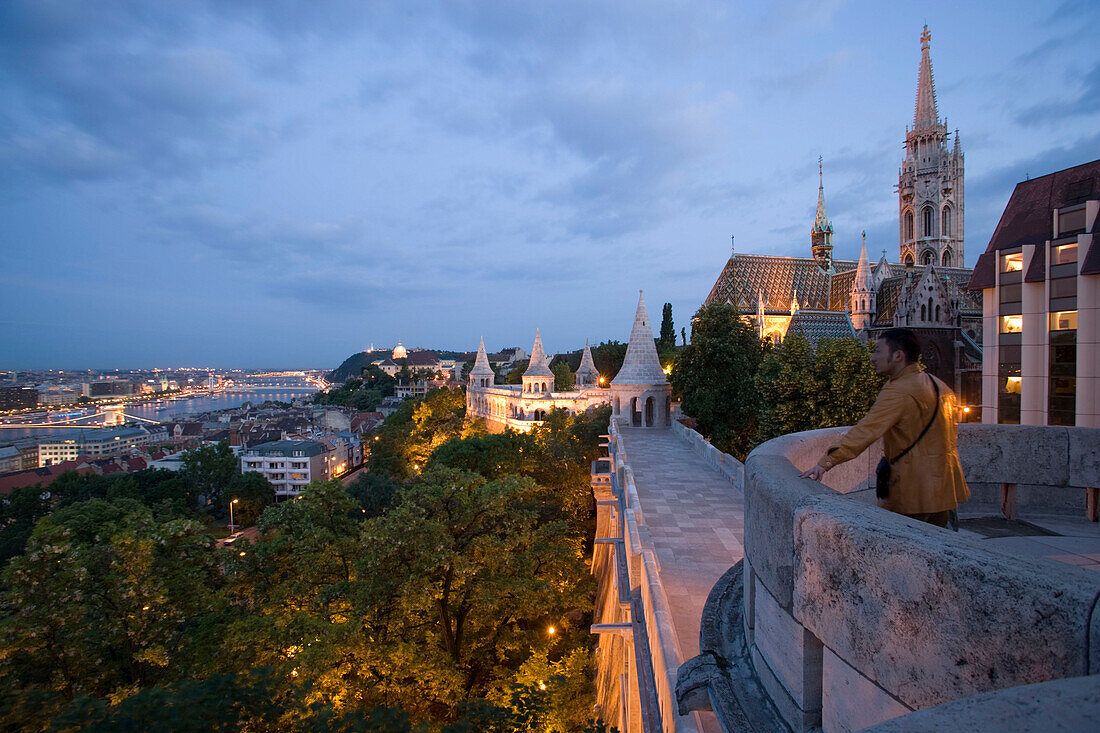 Fishermen's Bastion at Castle Hill, View along Fishermen's Bastion to Matthias Church at Castle Hill at night, Buda, Budapest, Hungary