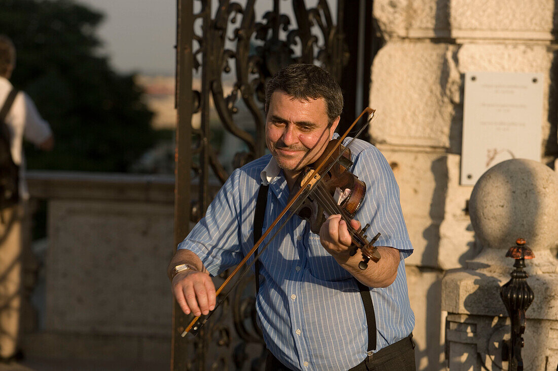 Fiddler at the area of Royal Palace, Fiddler at the area of Royal Palace on Castle Hill, Buda, Budapest, Hungary