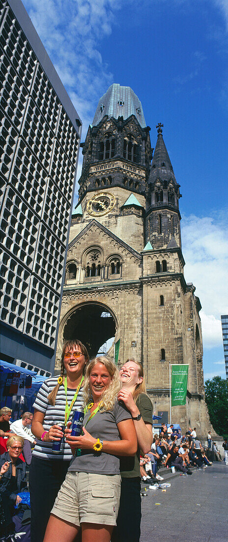 Tourists at the Kaiser Wilhelm memorial church, Berlin, Germany