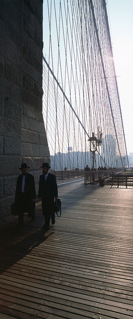 Orthodox Jewish people on Brooklyn Bridge, New York, USA