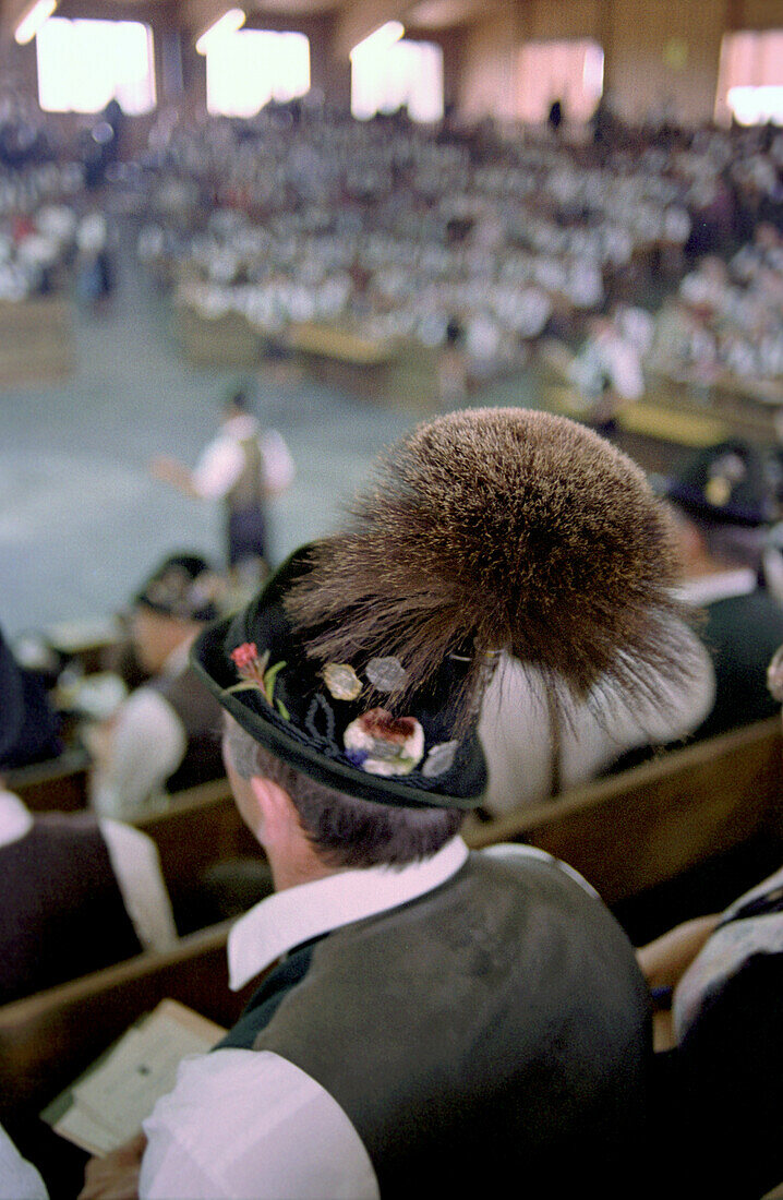 Rear view of a spectator at the Bavarian Goaslschnalzen Championships, Miesbach, Bavaria, Germany