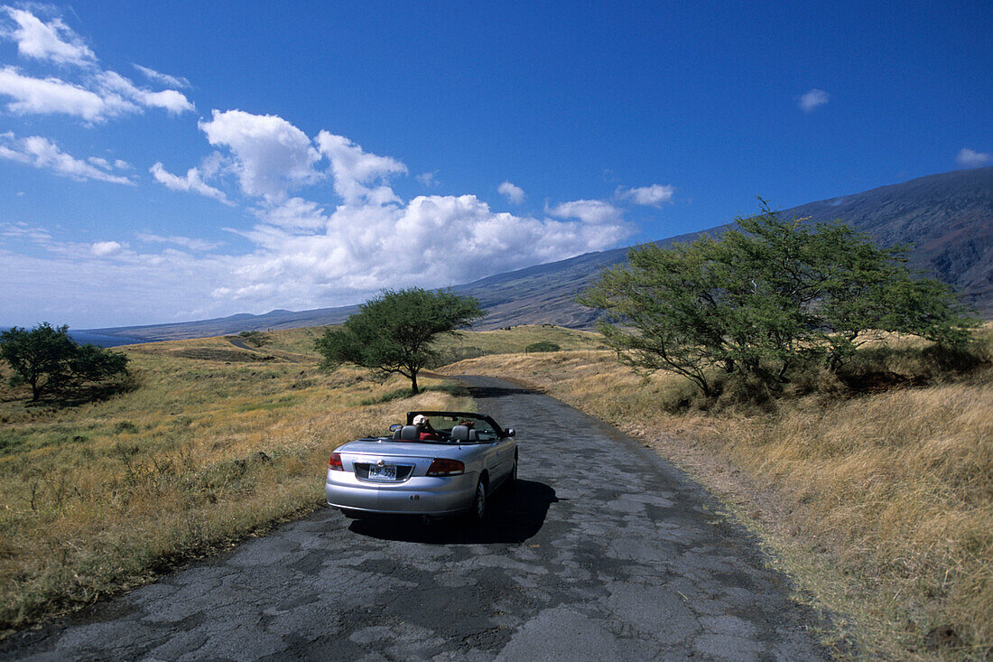 Convertible on Highway, Piilani Highway, Near Kaupo, Maui, Hawaii, USA