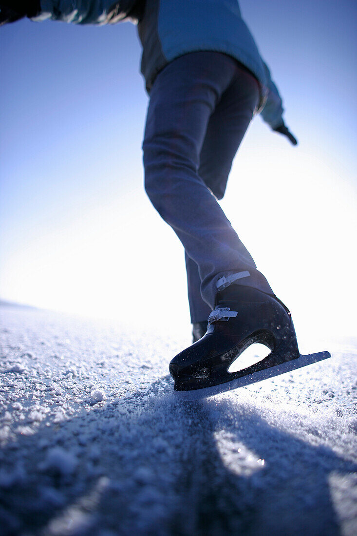 Young woman ice skating