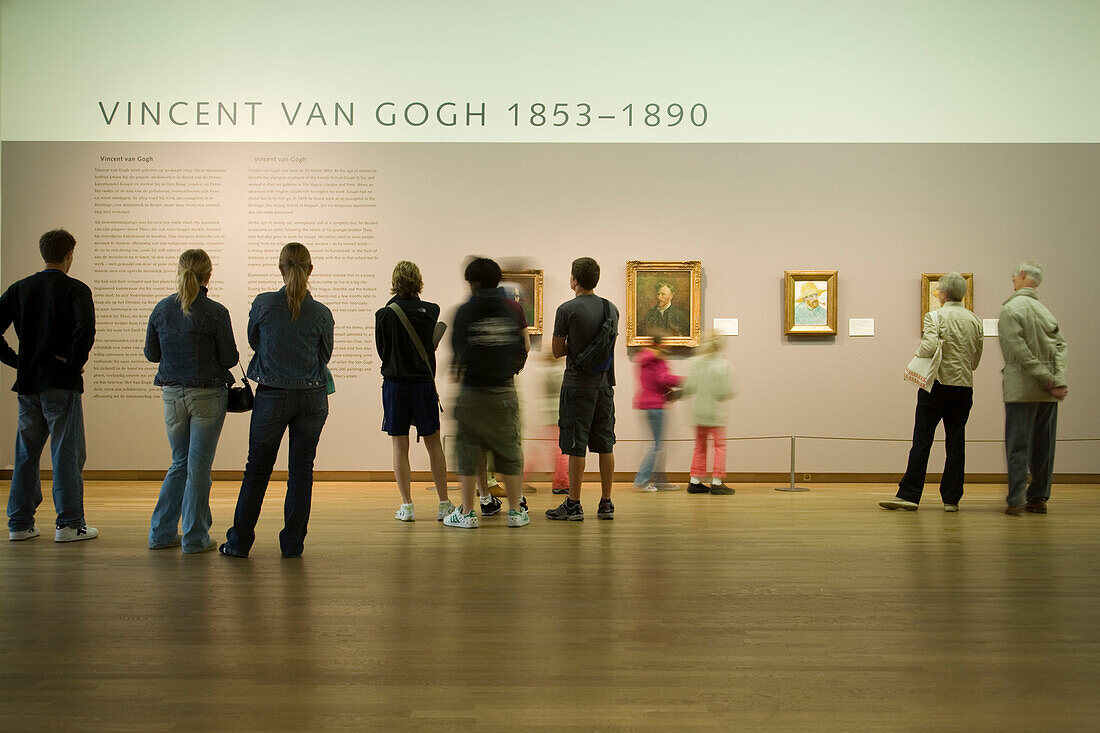 Visitors looking at paintings of van Gogh, Van Gogh Museum, Amsterdam, Netherlands