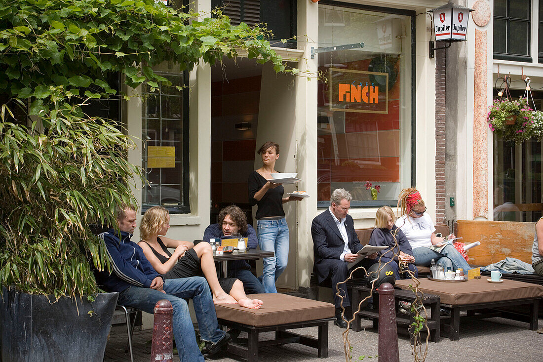 People, Cafe Finch, Jordaan, Waitress serves guests something to eat outside, Cafe Finch, Jordaan, Amsterdam, Holland, Netherlands