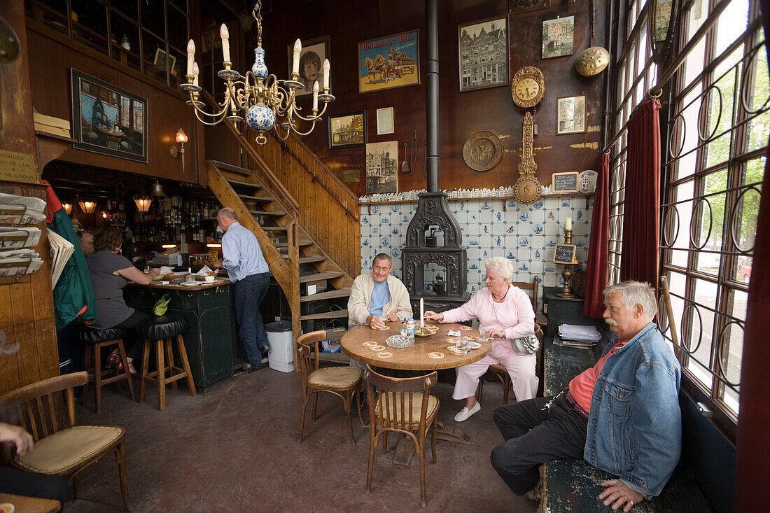 People, Het Papeneiland, Jordaan, People sitting in Het Papeneiland, the oldest brown or bruin cafe, Jordaan, Amsterdam, Holland, Netherlands
