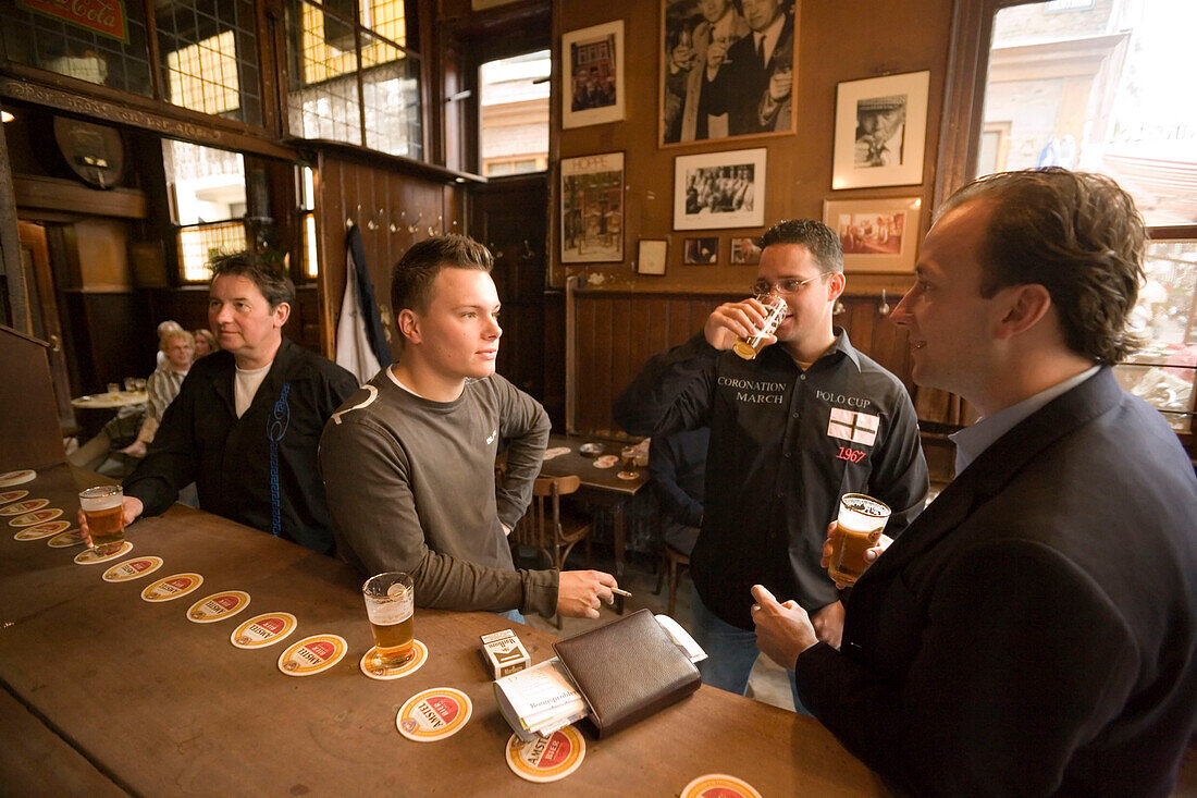 Men, Drinking, Hoppe, Proeflokaal, Men drinking beer, Hoppe Proeflokaal, , bruin or brown cafe, Spui, Amsterdam, Holland, Netherlands