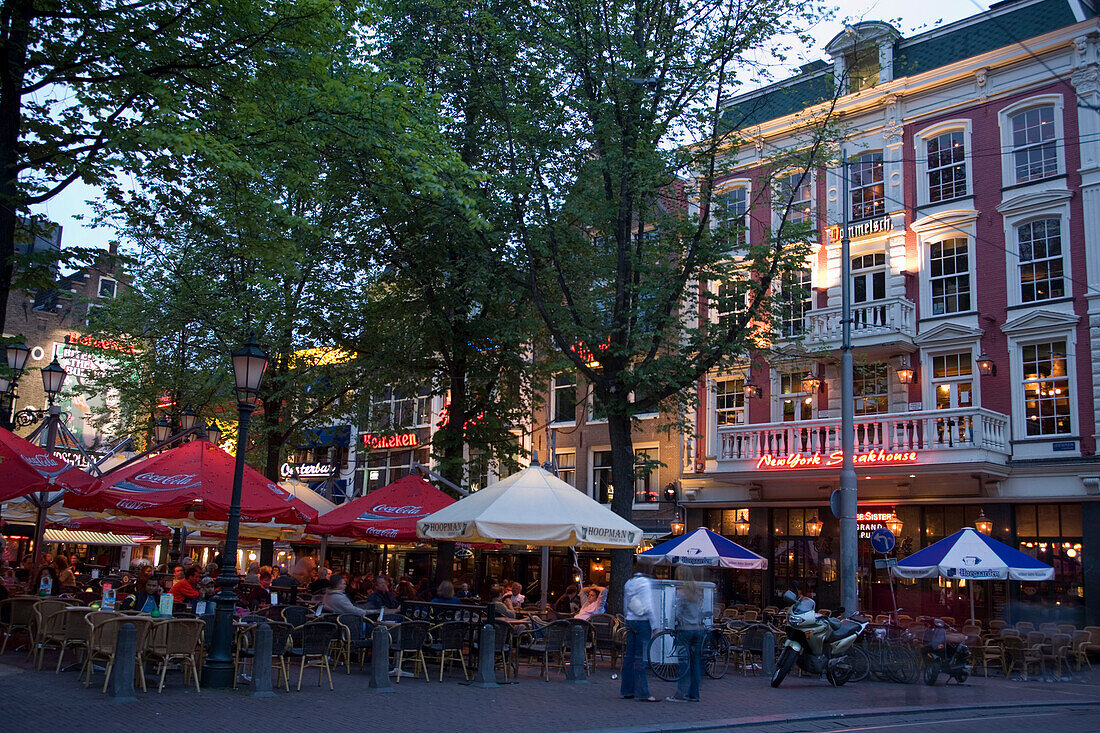 People, Restaurants and Bars, Leidseplein, Open air restaurants and bars in the evening, Leidseplein, Amsterdam, Holland, Netherlands