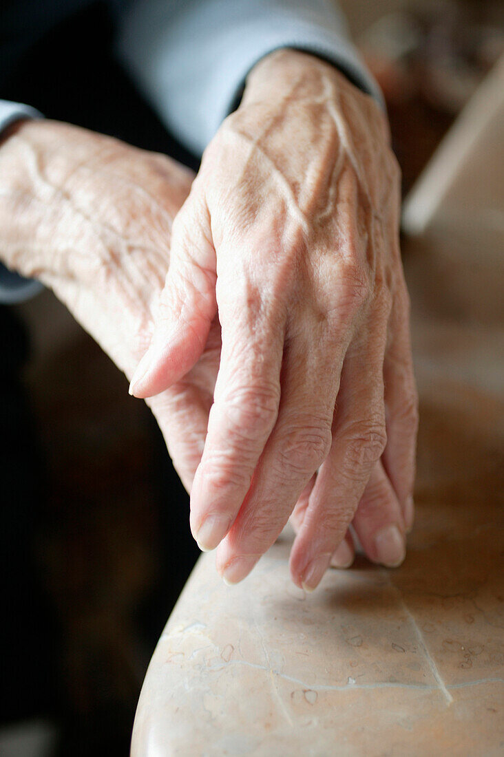 Hands of a senior woman, close up
