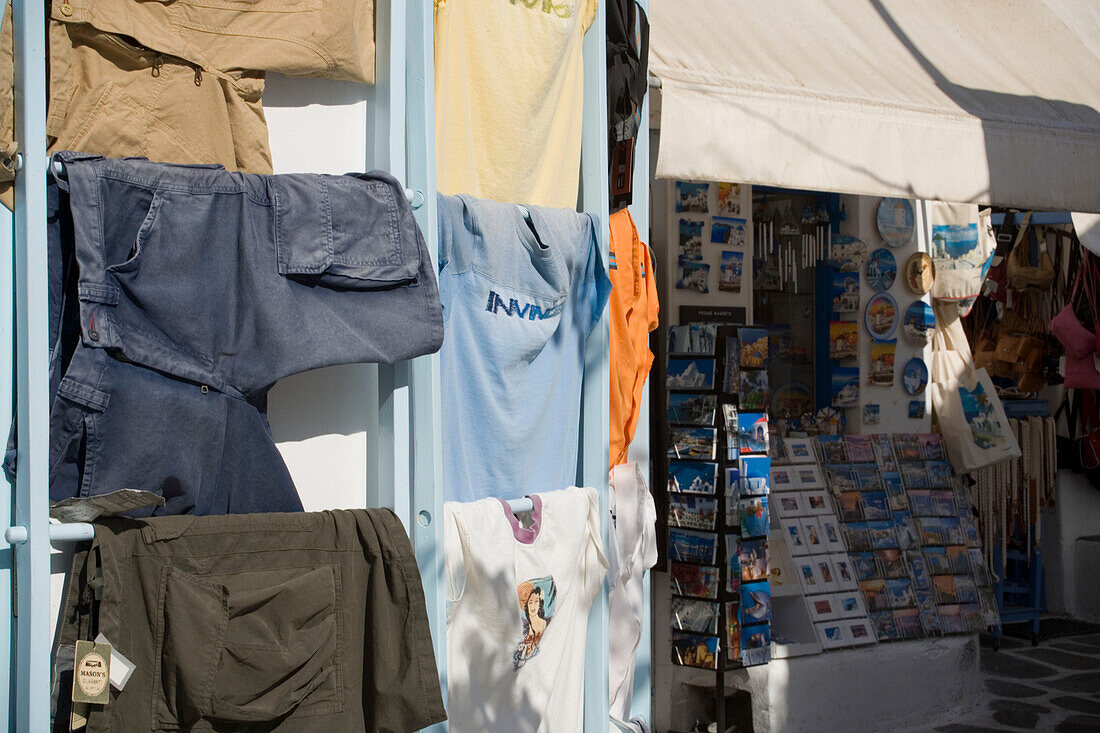 Clothes hanging outside of a clothes shop at shopping street, Mykonos-Town, Mykonos, Greece