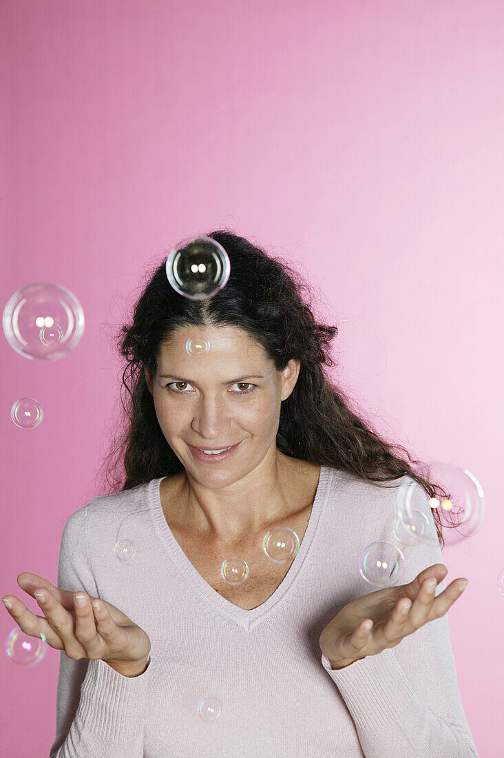 Woman with soap bubbles, Portrait