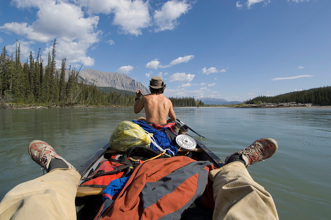 Relaxed rowing on South Nahanni River, Northwest Territories, Canada
