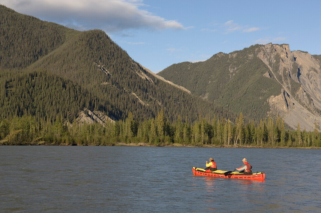 Two people in a canoo, South Nahanni River, Northwest Territories, Canada