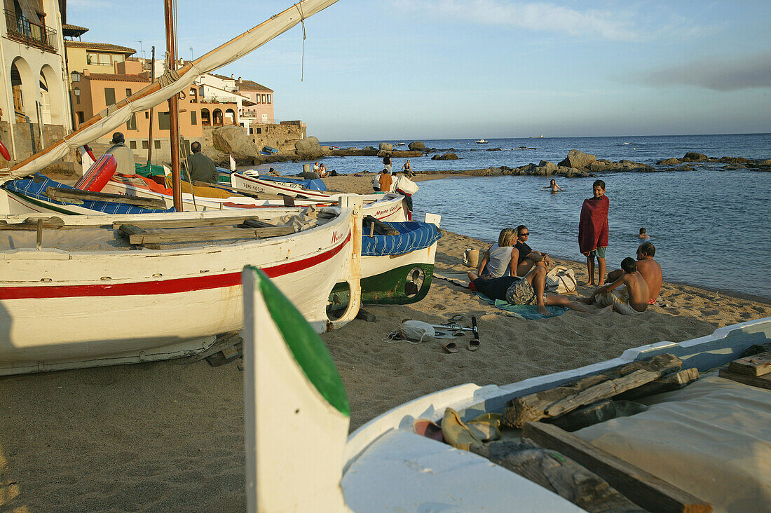 Costa Brava, people bathing on the beach at Callela, Costa Brava, Catalonia Spain