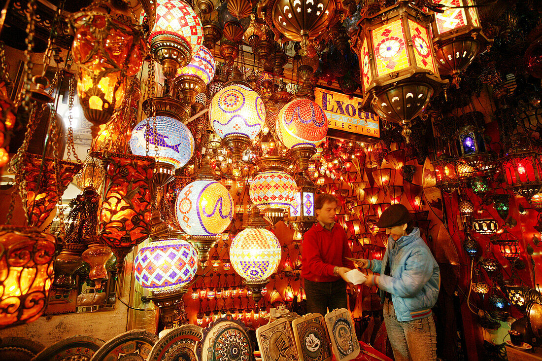 Salesman for colourful lamps in the indoor market "kapali",Istanbul, Turkey