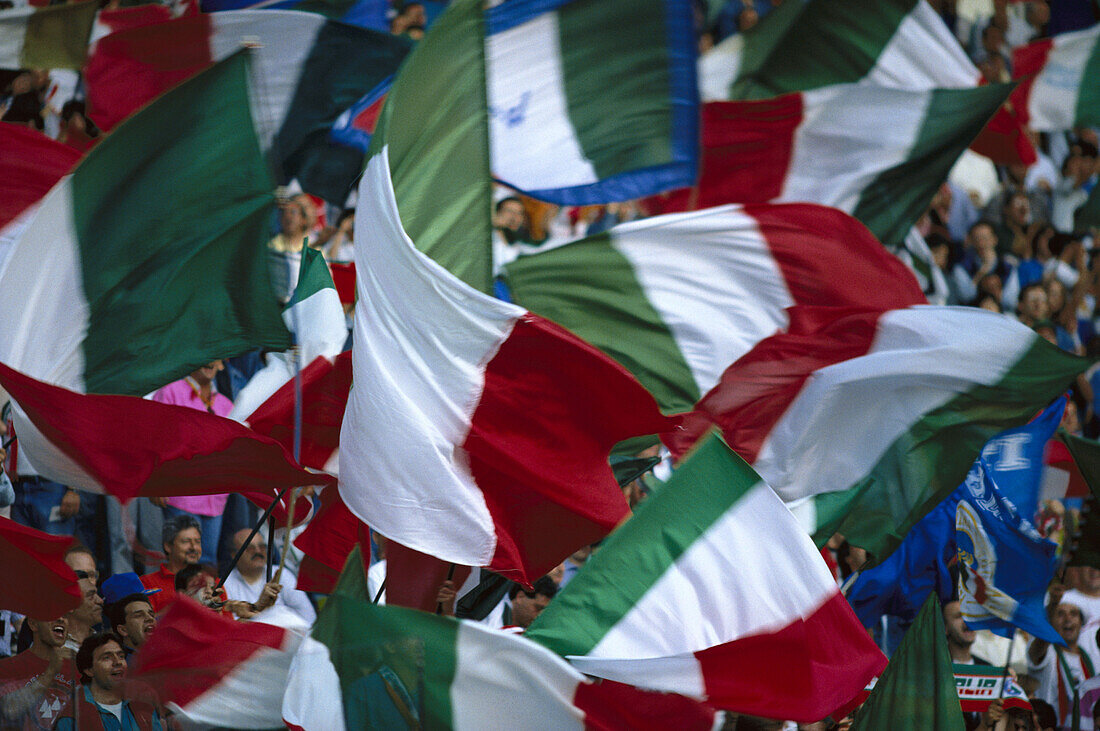 Italian soccer fans swaying flags