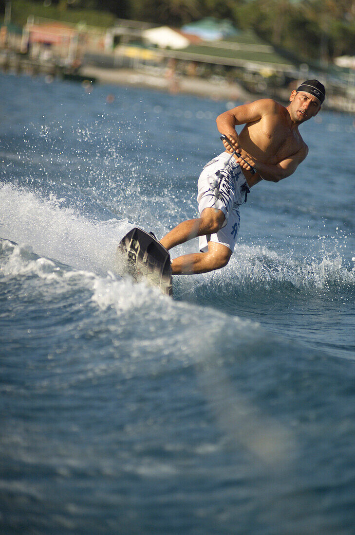Man waterskiing, sports man waveboarding