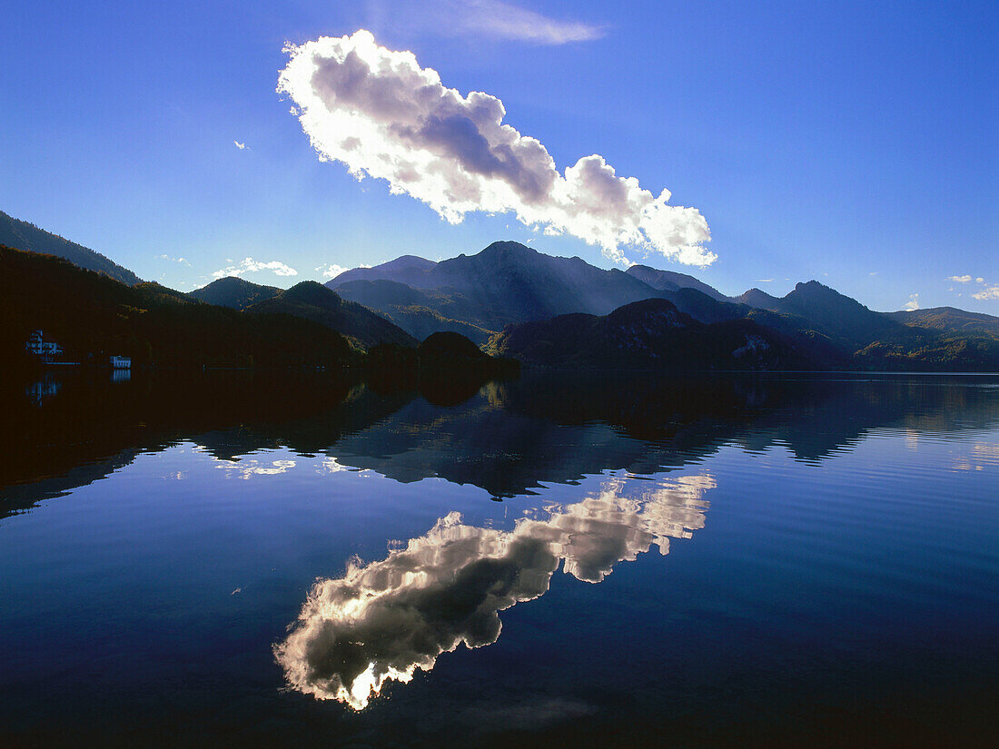 Clouds reflecting on water surface, Kochelsee, Upper Bavaria, Germany
