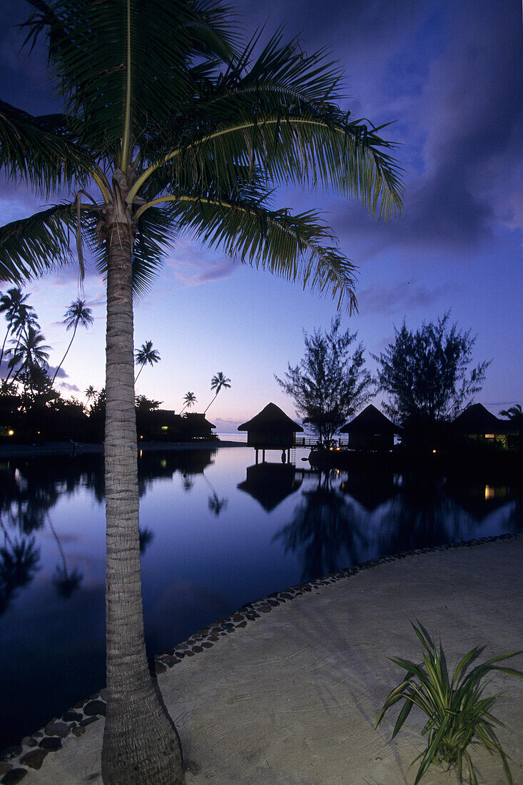 Overwater Bungalows at Dusk,InterContinental Beachcomber Resort, Moorea, French Polynesia