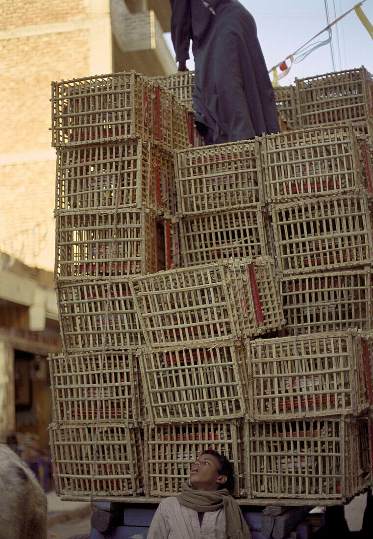 A high pile of baskets, goods of a salesman, Luxor, Egypt