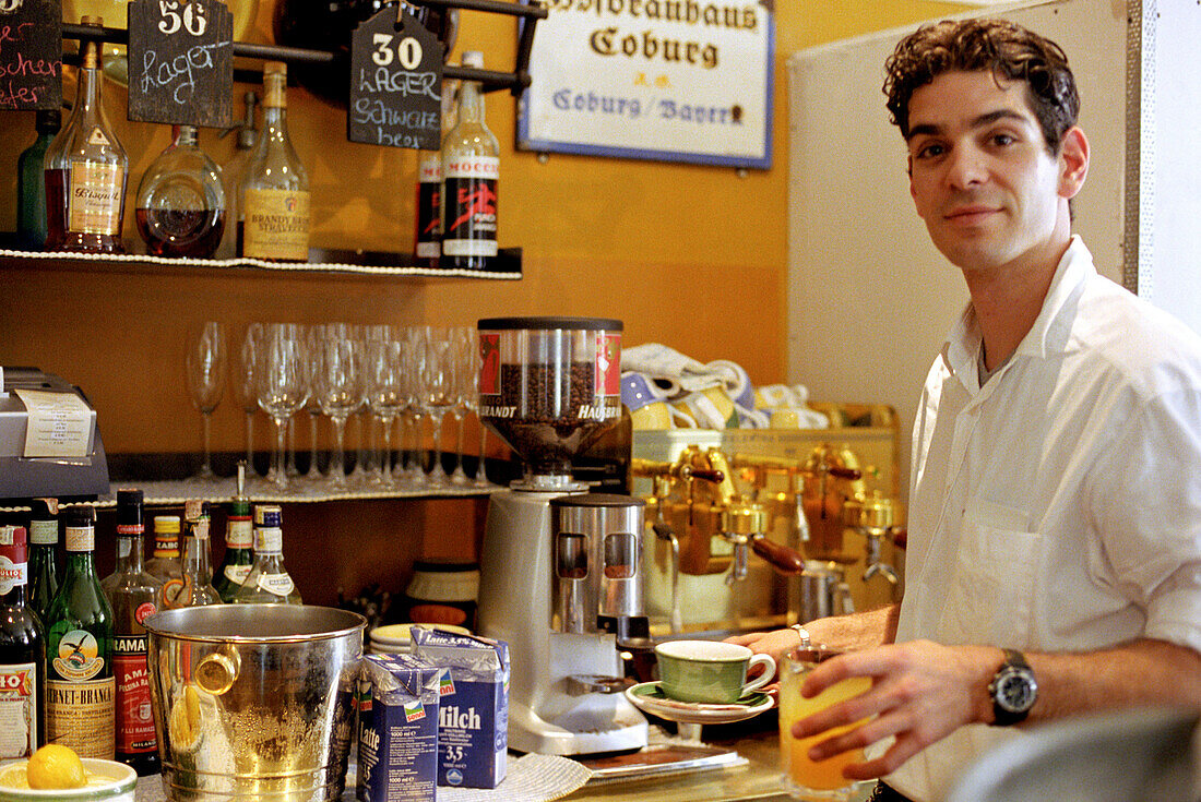 Barkeeper in Cafe, Bolzano, South Tyrol, Italy