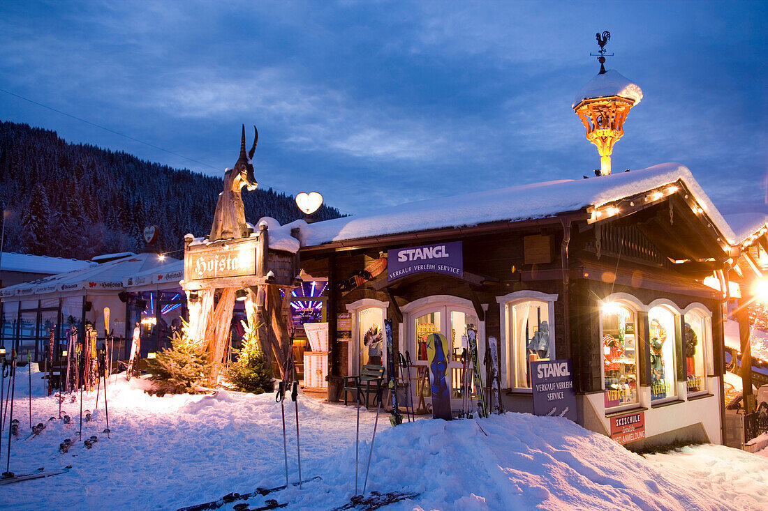 Sport Stangl and the Hofstadl, the first Apres-Ski Bar of Flachau, in the evening, Flachau (927 m), Salzburger Land, Austria