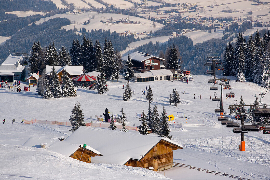 View over ski lift to Birkhahnalm and Griesskarhaus, Flachau, Salzburger Land, Austria