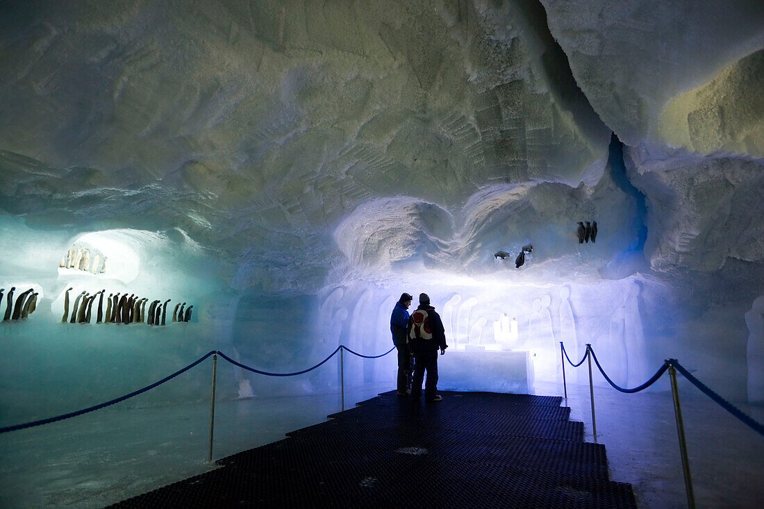 People visiting the world's biggest ice pavilion on Allalin, Saas-Fee, Valais, Switzerland