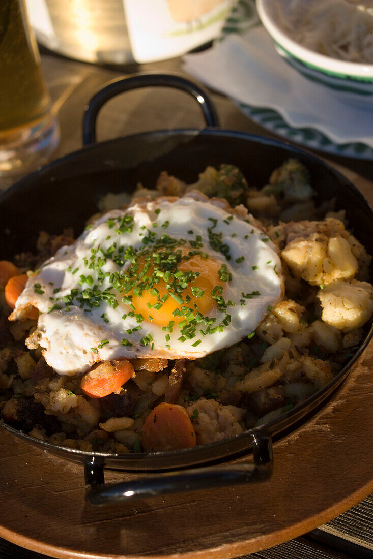 A delicacy, named Bauernschmaus (potato pan) served in the restaurant Schafalm, Planai, Schladming, Ski Amade, Austria