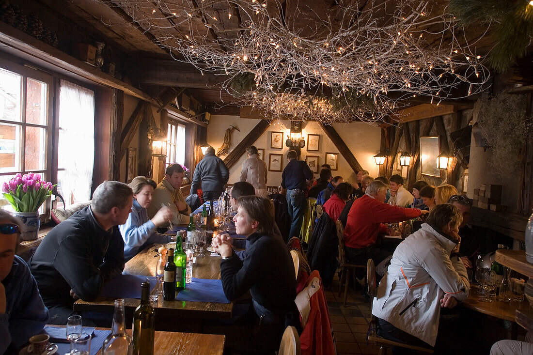People sitting inside the Restaurant zum See, Zum See, Zermatt, Valais, Switzerland