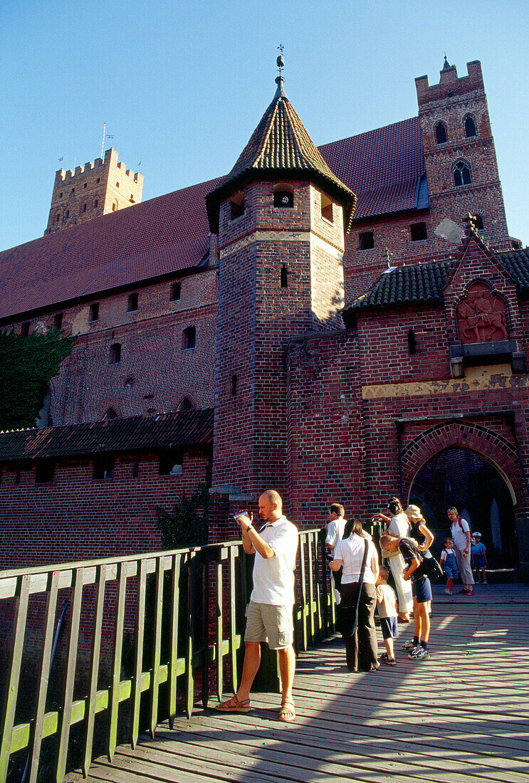 Castle  in Malbork, Poland,Tourists in the Castle of the Teutonic Knights in Malbork (13th - 14th centuries), Poland