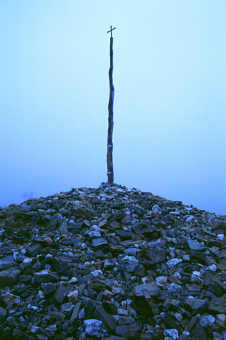 Cross with stone cairn, near Foncebadon,Camino de Santiago,Province Leon,Castilla-Leon,Spain