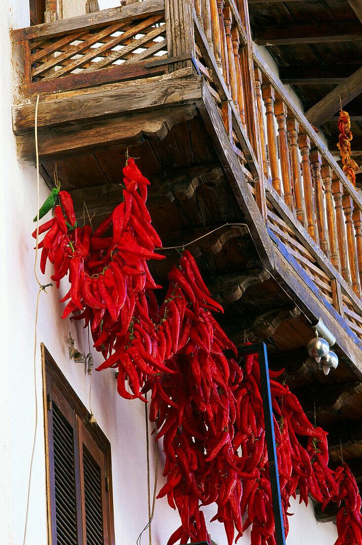 Red peppers hanging at the balcony of restaurant La Cueva&quot, Cazorla, Province of Jaen, Andalusia, Spain, Europe