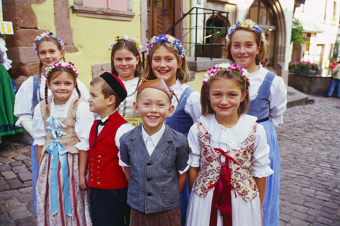 Children in Traditional Alsatian Dress in Riquewihr,Elsass,France