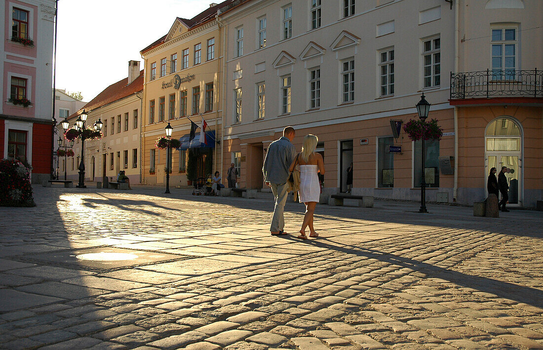 couple on town hall square, Tartu, Estonia