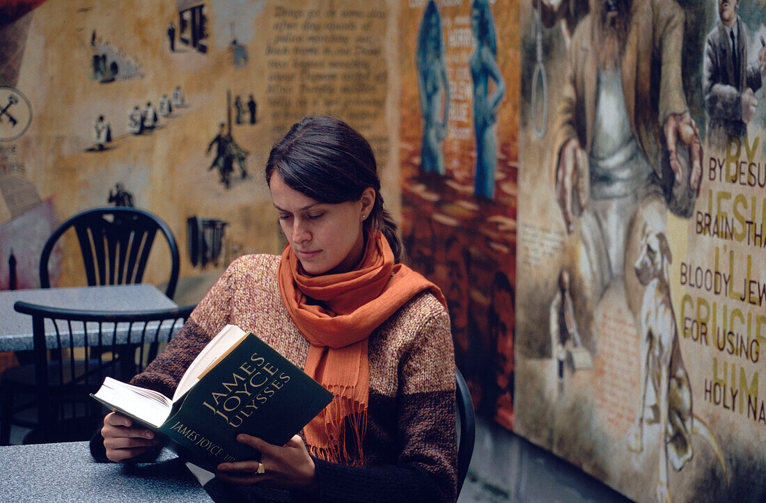Girl reading Ulysses at James Joyce Centre, Dublin, Ireland