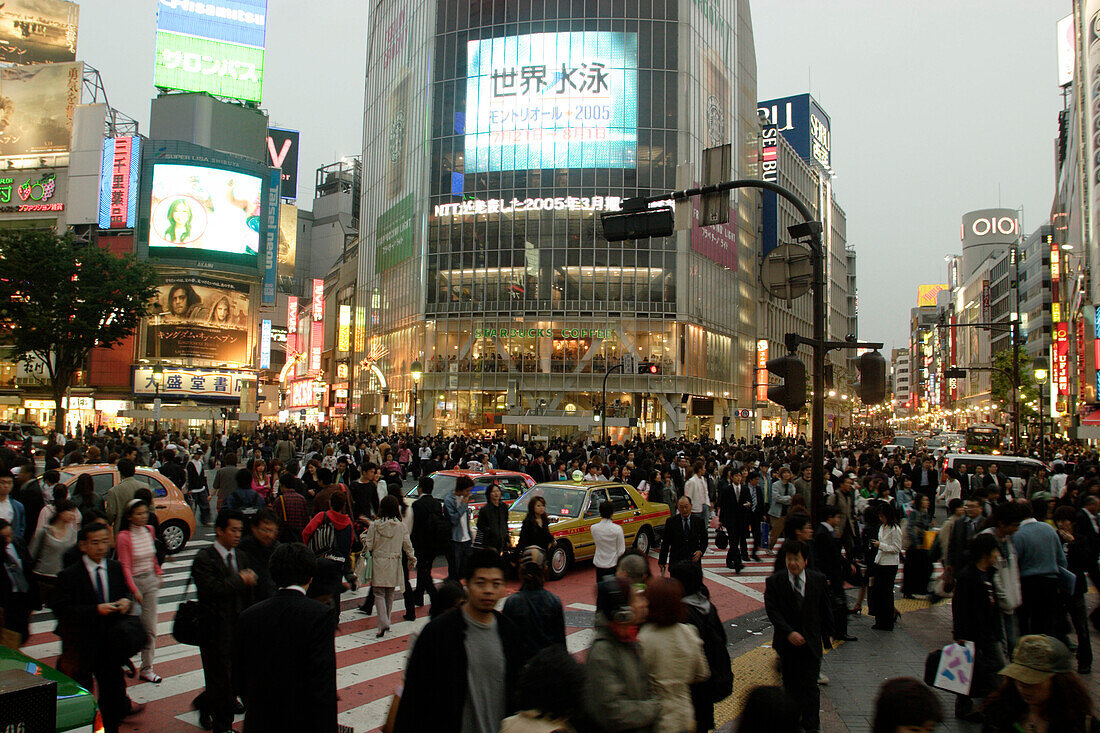 Business people, Rush-hour, large intersection in front of the Shibuya Station, Hachiko Exit,  subway, Metro, station, JR Yamanote Line,Tokio, Tokyo, Japan