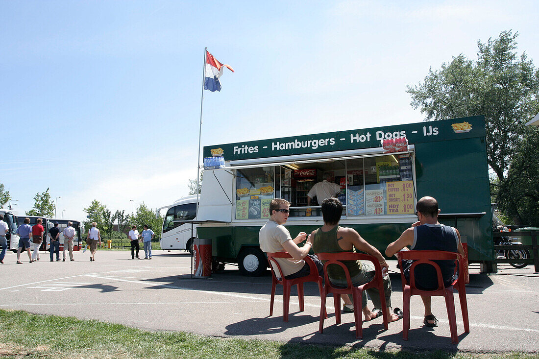 Food stall in front of cruise ship MS Delphin Renaissance, Cruise Bremerhaven - South England, England