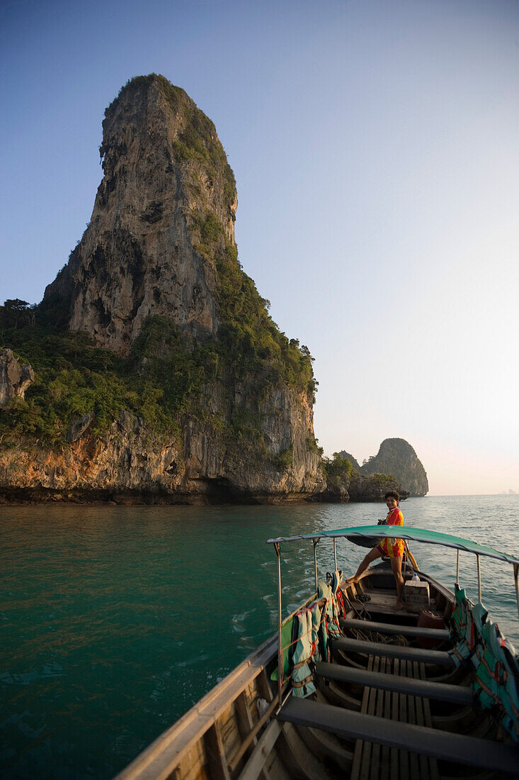 View from a Longtail Boat to Railay West with chalk cliff, Laem Phra Nang, Railay, Krabi, Thailand