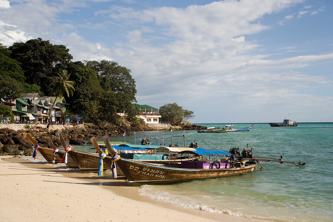 Long tail boats anchoring at beach of Ao Ton Sai, Banyan Tree Bay, Ko Phi Phi Don, Ko Phi Phi Island, Krabi, Thailand, after the tsunami