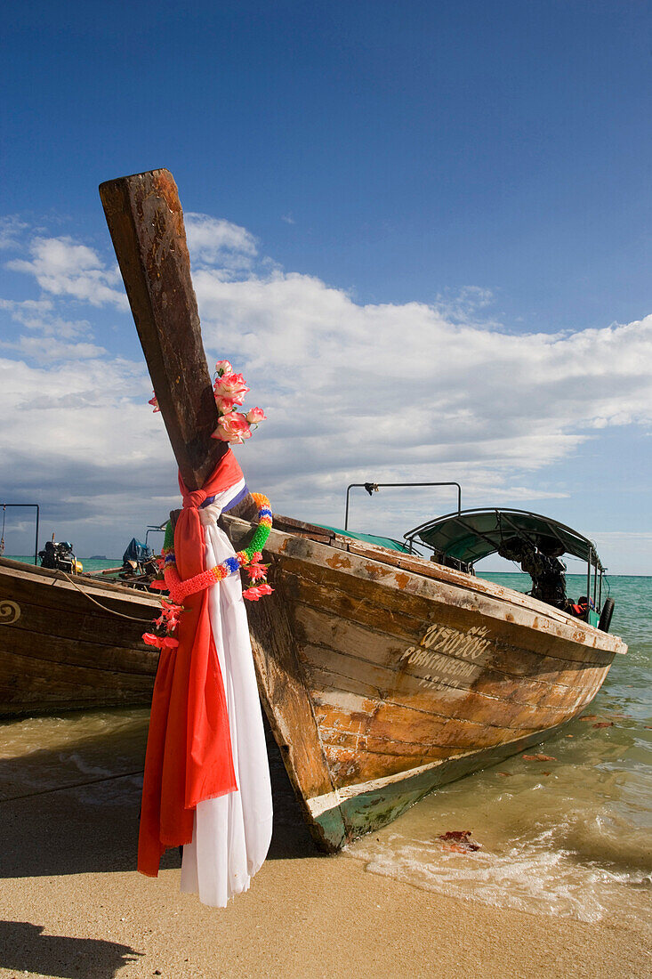 Close-up of anchored long-tail boats at beach of Ao Ton Sai, Banyan Tree Bay, Ko Phi Phi Don, Ko Phi Phi Island, Krabi, Thailand, after the tsunami