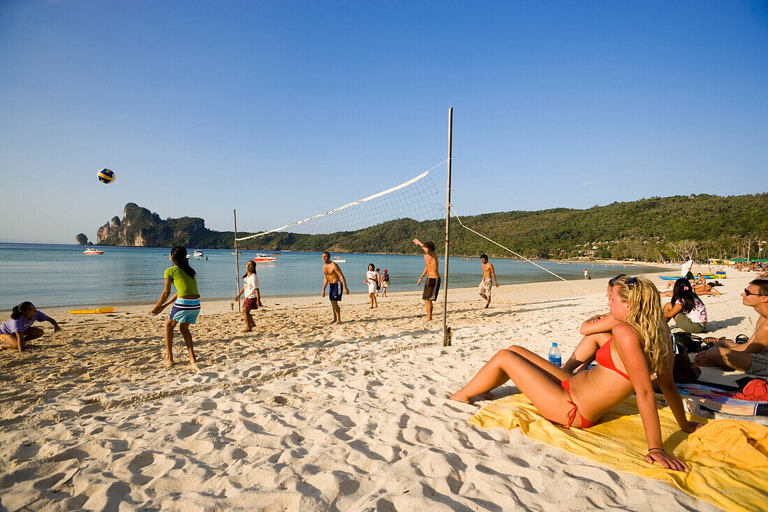 Young people playing beach volleyball, Ao Lo Dalam, Lohdalum Bay, Ko Phi Phi Don, Ko Phi Phi Island, Krabi, Thailand, after the tsunami