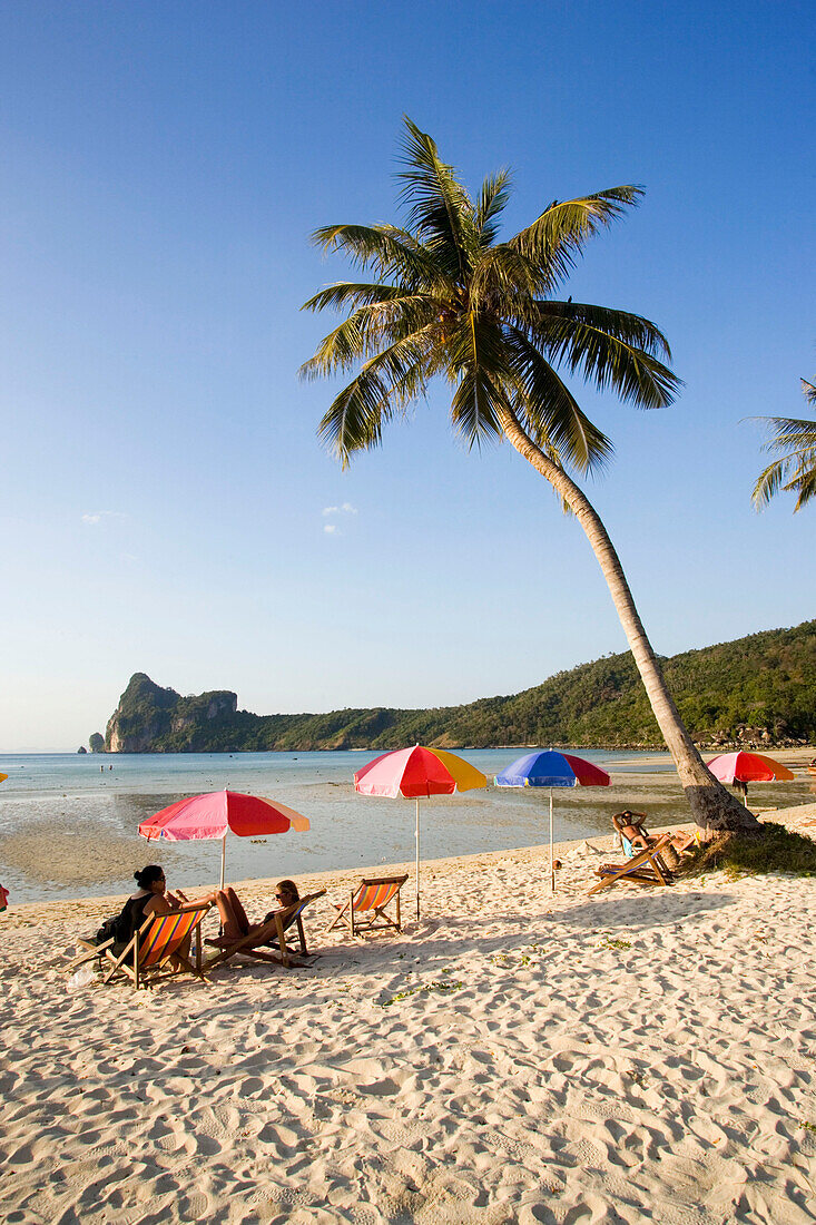 Tourists sunbathing at beach Ao Lo Dalam, Lohdalum Bay, Ko Phi Phi Don, Ko Phi Phi Island, Krabi, Thailand, after the tsunami